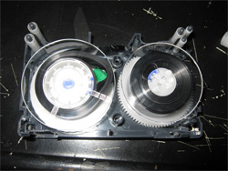 VHS-C with tab stuck in tape reel